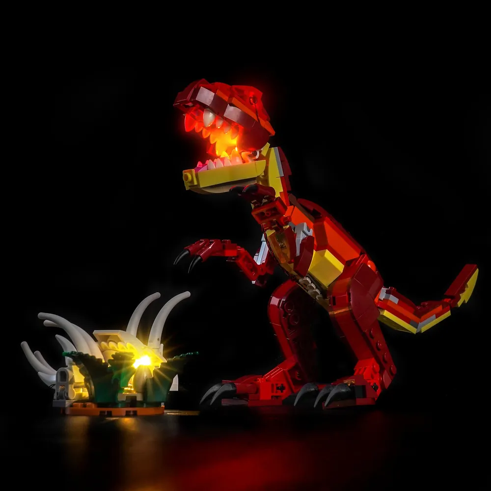 BrickBling LED kit casting light on the pterodactyl's wings and head crest from LEGO 31379
