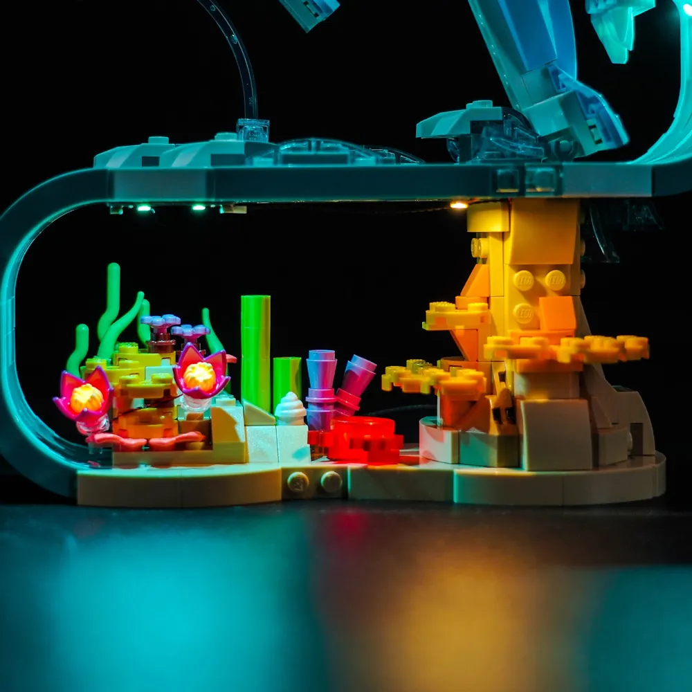 Close-up of BrickBling LED modules on LEGO Creator dolphin set showing wire management