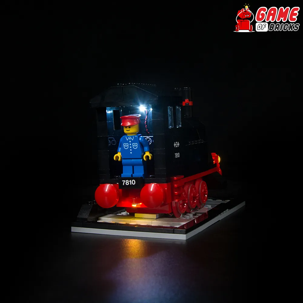 LEGO 40370 with Game of Bricks lights highlighting red wheels and smokestack