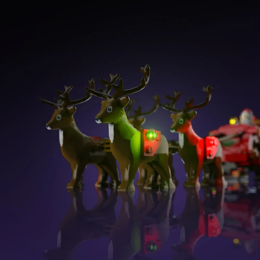 LEGO Santa's Sleigh 40499 with Light My Bricks lights in a showcase