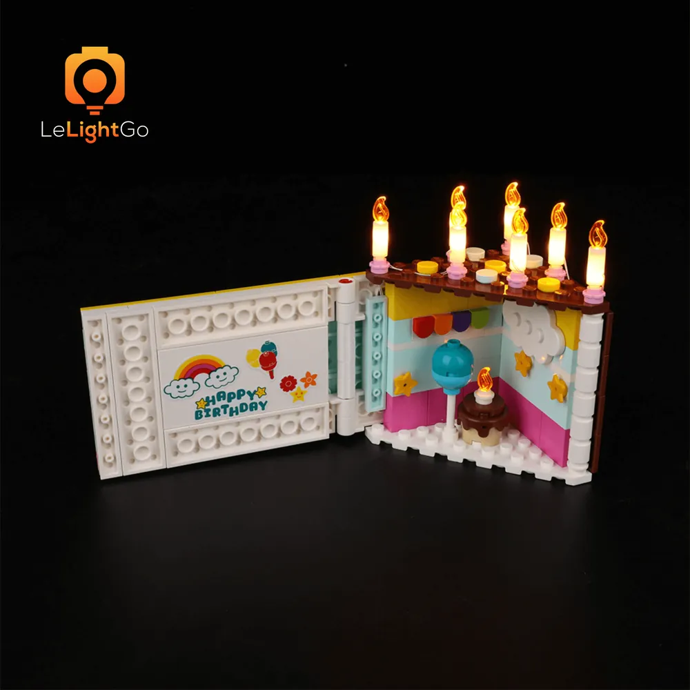 LEGO Birthday Cake 40641 lit with LeLightGo kit, showing interior and slide lights