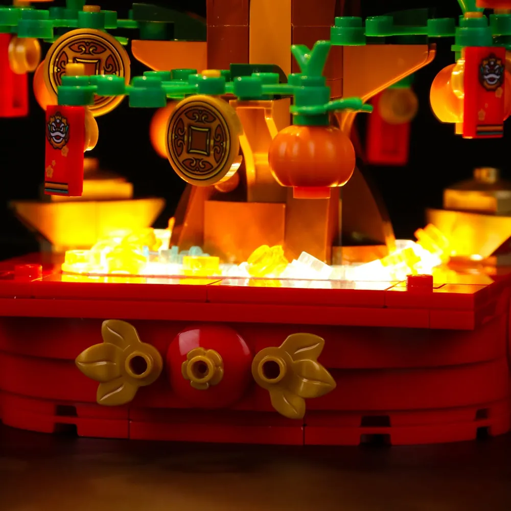 BrickBling LED kit installed on LEGO Money Tree with red envelopes lit