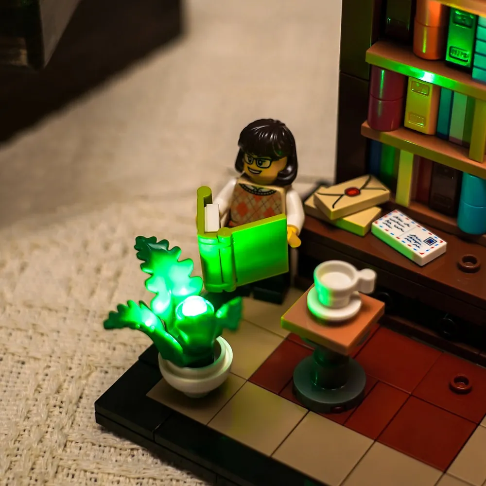 LEGO Ideas 40698 with warm light highlighting reading nook