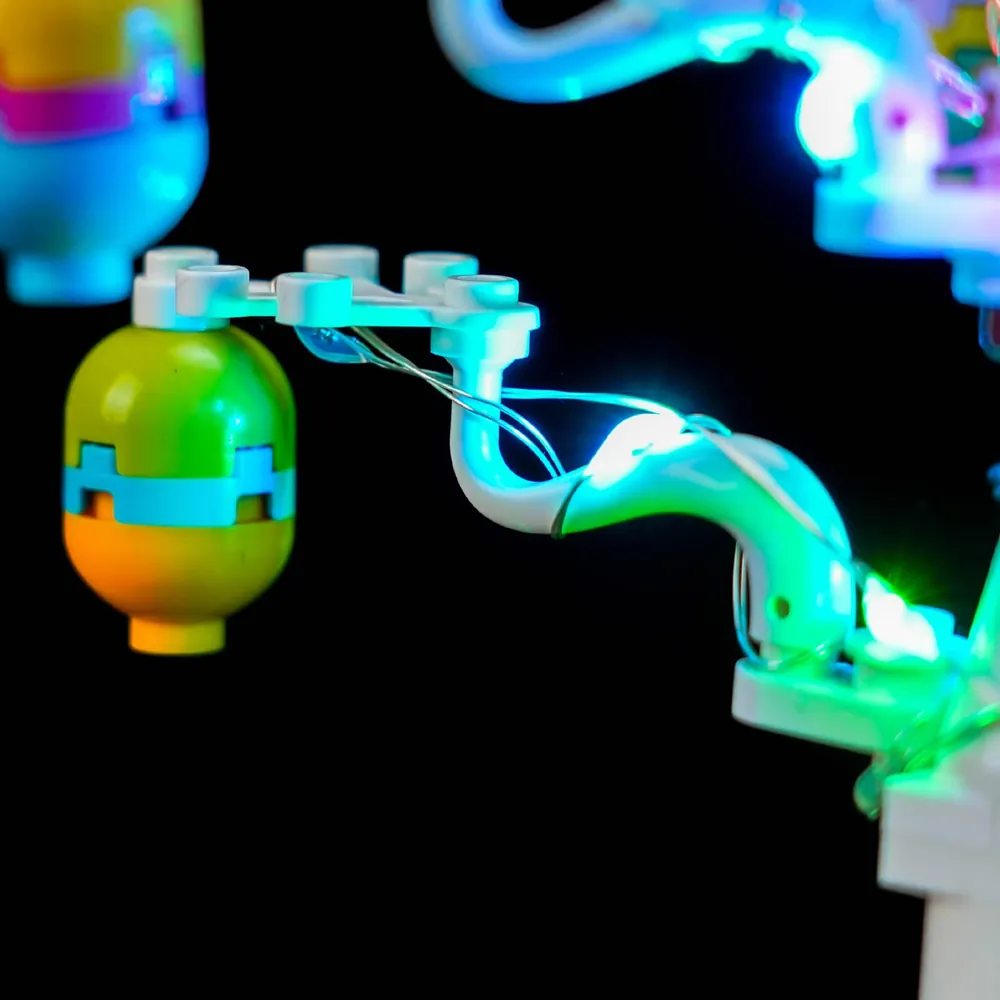 Close-up of BrickBling micro-LEDs lighting the bunny and chick in LEGO 40808