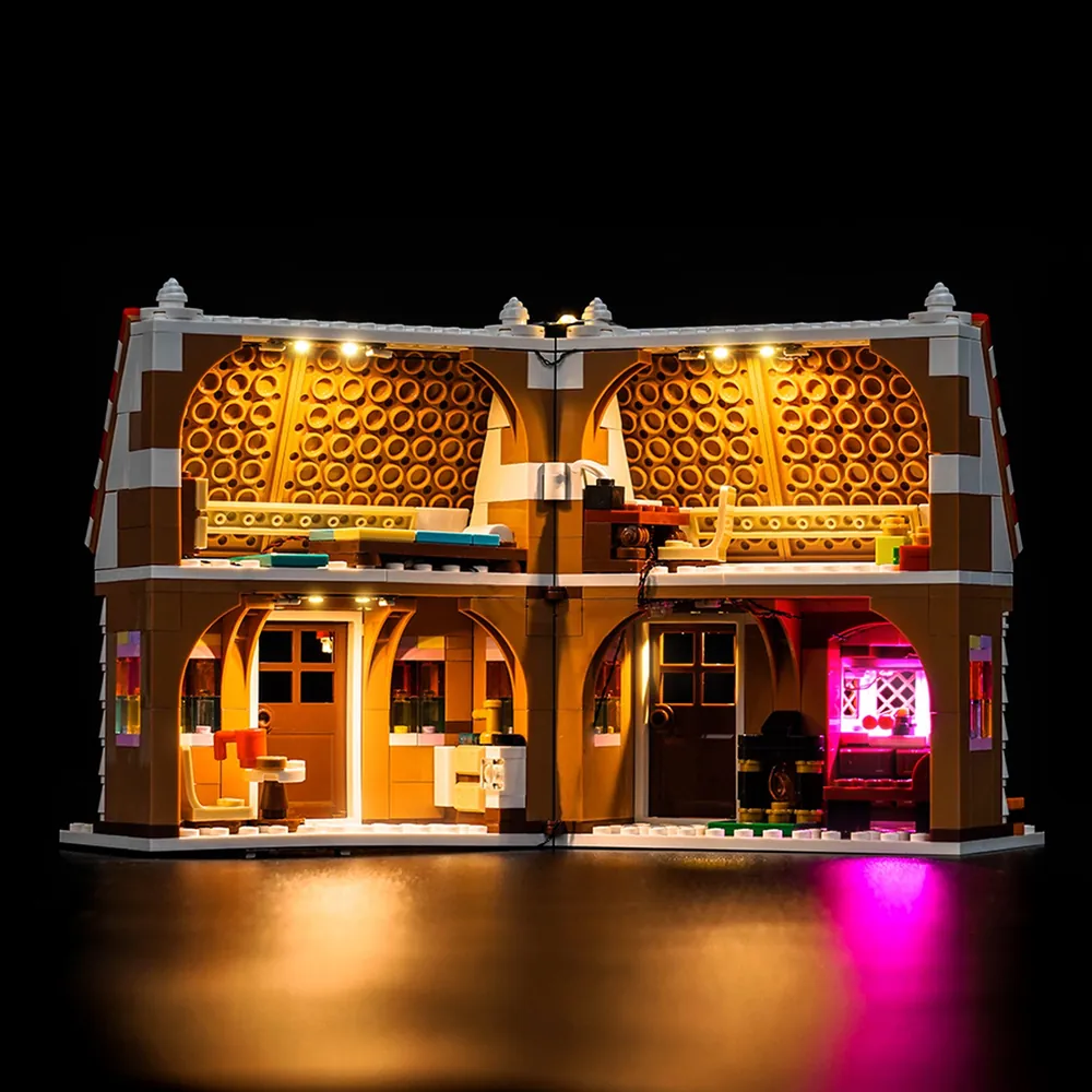 Festive Gingerbread House 40809 with BrickBling remote control lighting in a holiday display