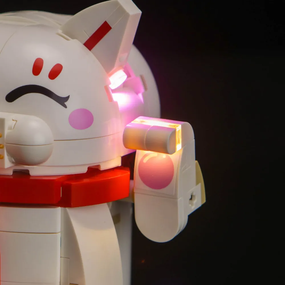 LEGO Lucky Cat 40813 with BrickBling lighting on a shelf, glowing display