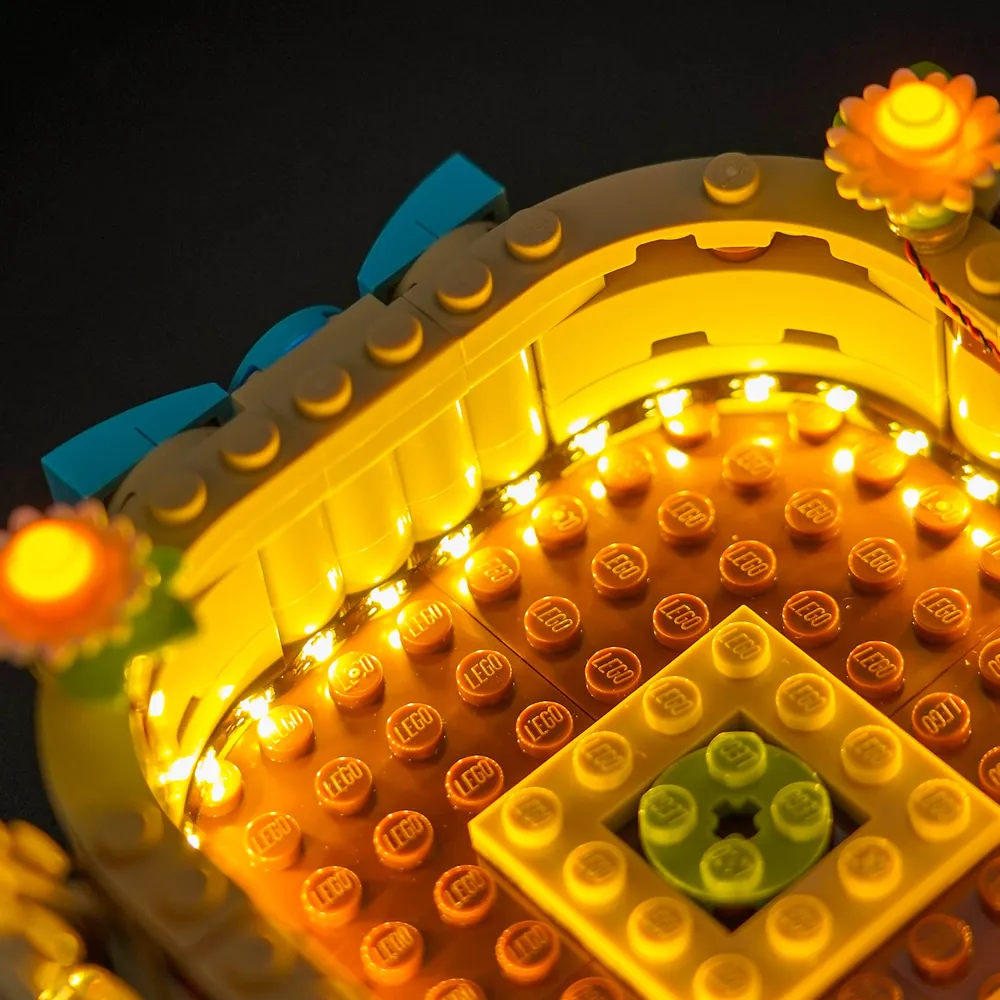 Close-up of BrickBling micro-LED installation on LEGO Easter Egg Basket 40863 highlighting the basket weave