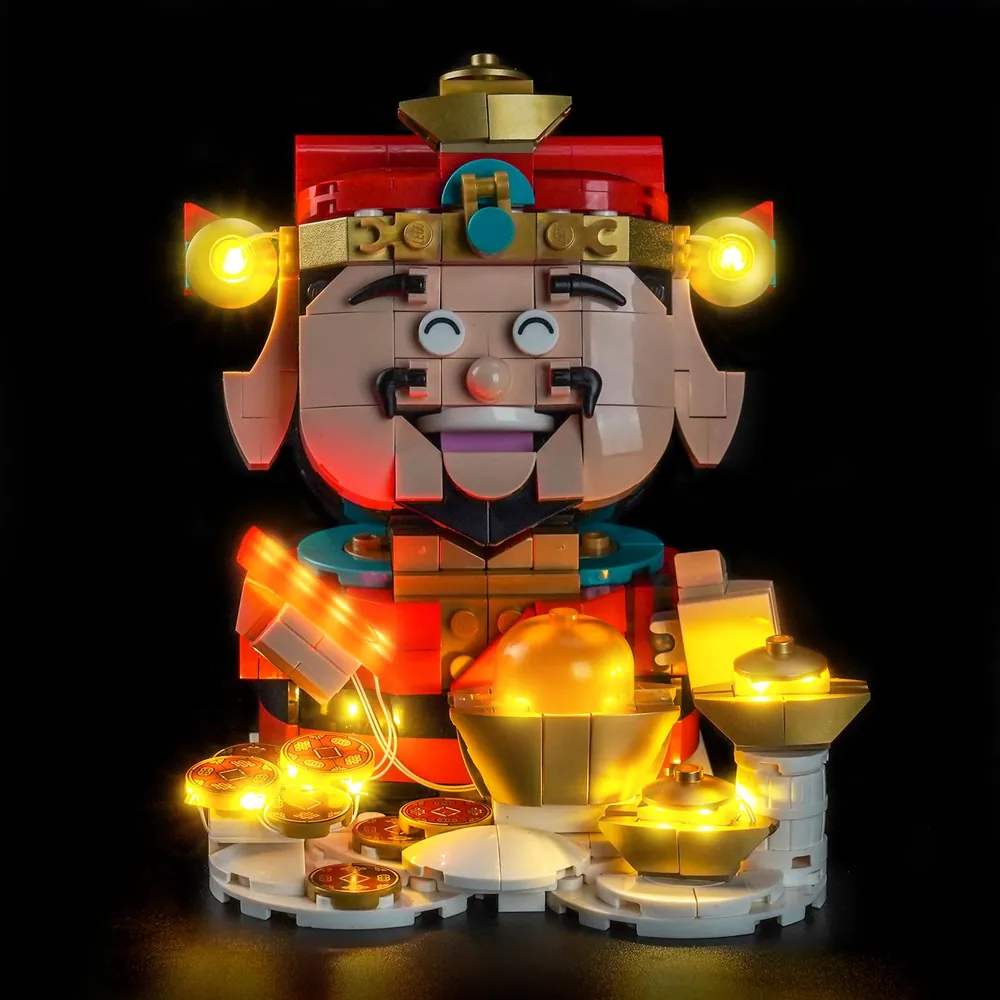 BrickBling light kit for LEGO Fortune Master 40864 illuminating the face and gold accents