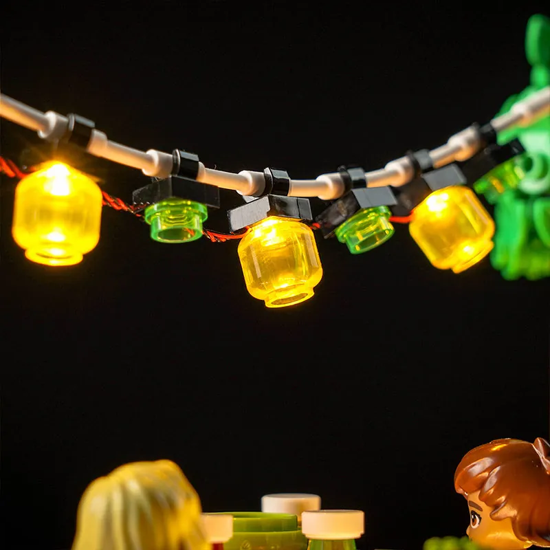 BrickBling LED kit for LEGO 41747, illuminating the upper terrace dining table