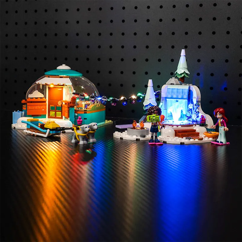 BrickBling LED kit illuminating the LEGO Igloo Holiday Adventure 41760 interior