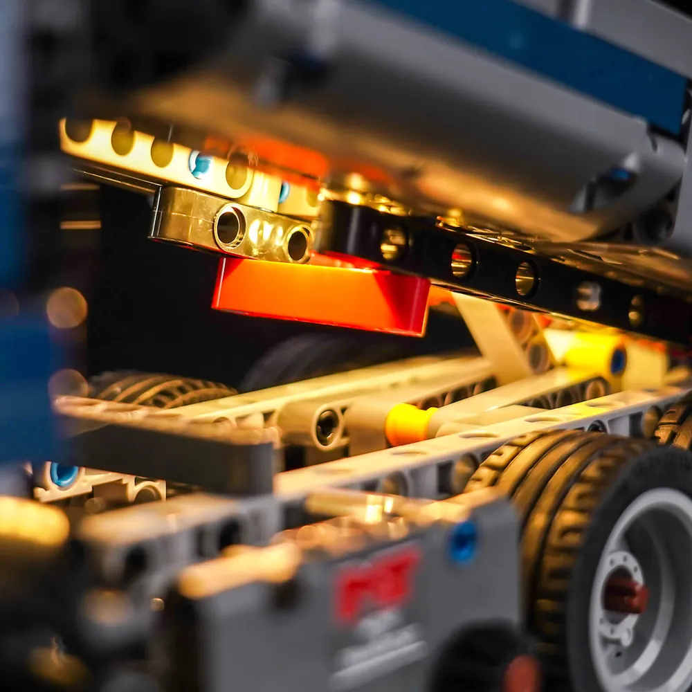 Close-up of BrickBling modular micro-LEDs installed on LEGO Technic dump truck cab interior