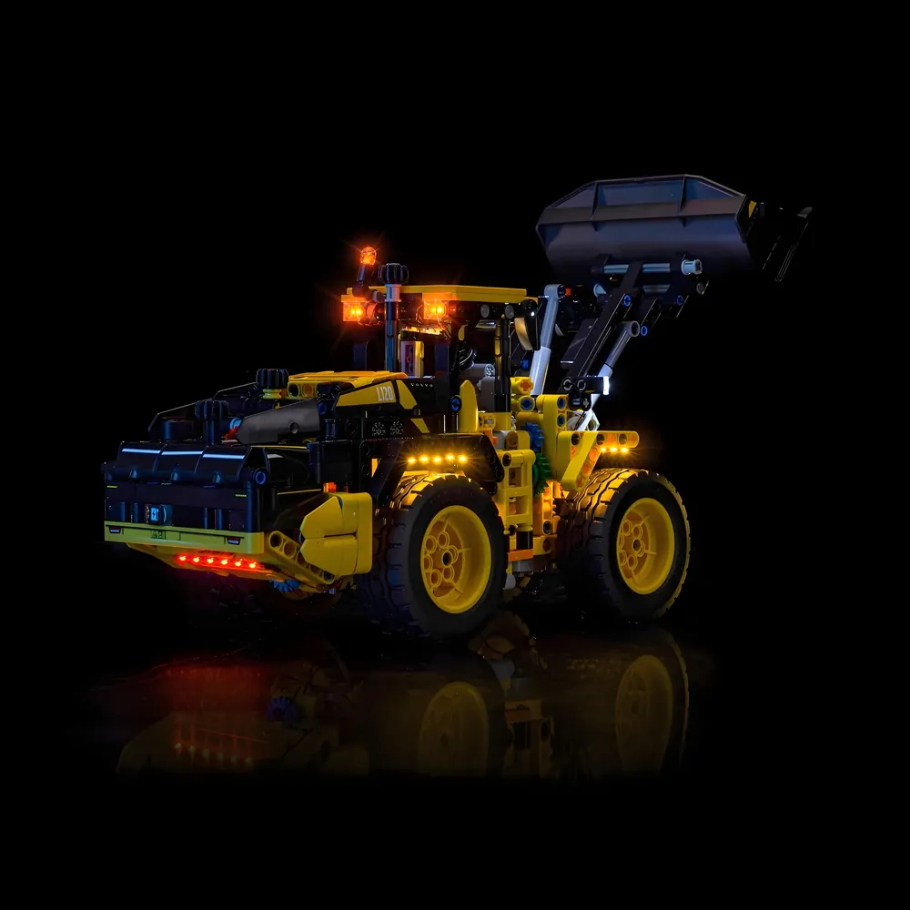 LEGO Volvo L120 Electric Wheel Loader with lighting kit, showcasing the boom and chassis illumination