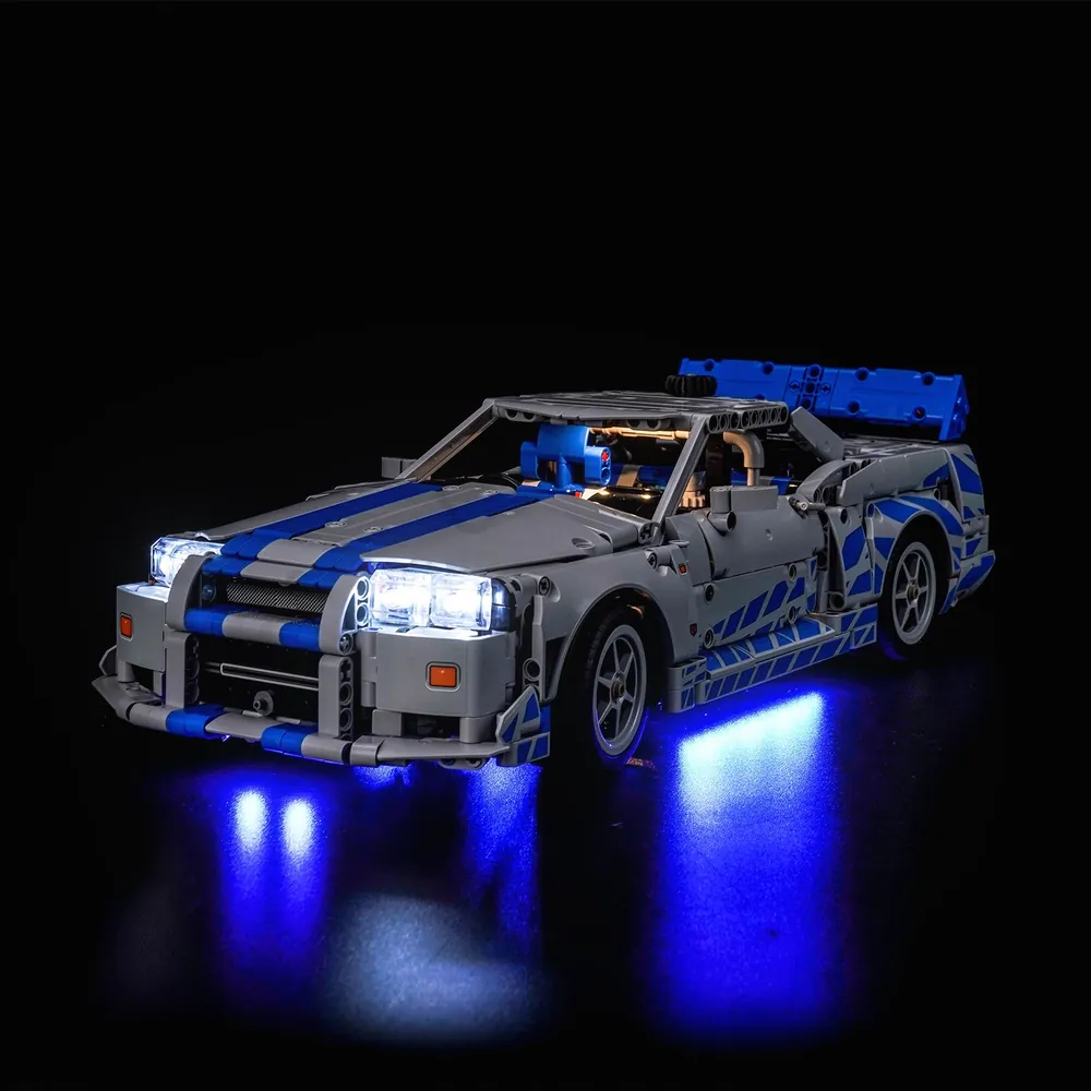 BrickBling LED kit for LEGO Technic R34 Skyline showing headlights and taillights illuminated