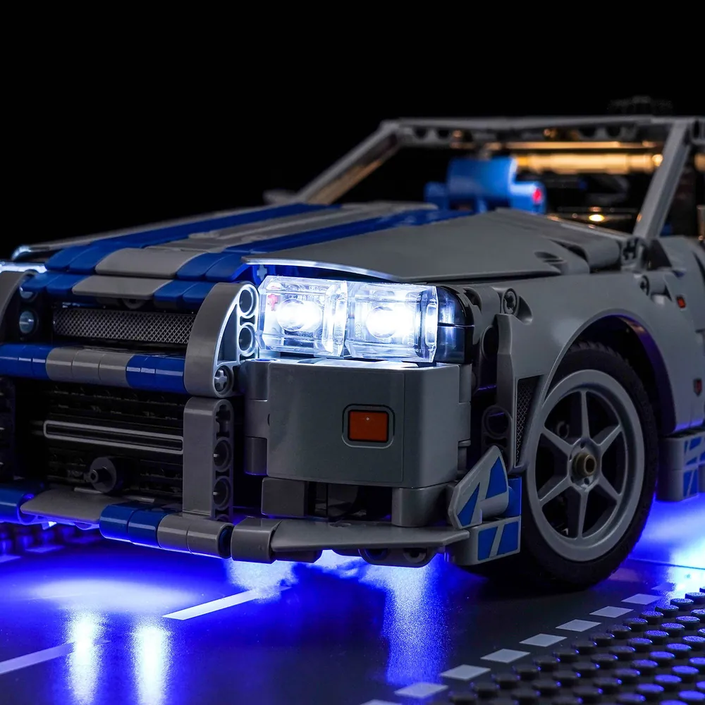 Close-up of BrickBling modular micro-LEDs on the LEGO R34 for engine bay lighting
