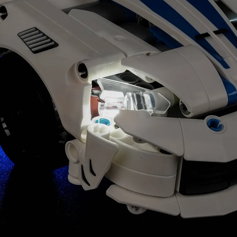 Close-up of BrickBling LEDs illuminating the V10 engine bay of LEGO Dodge Viper