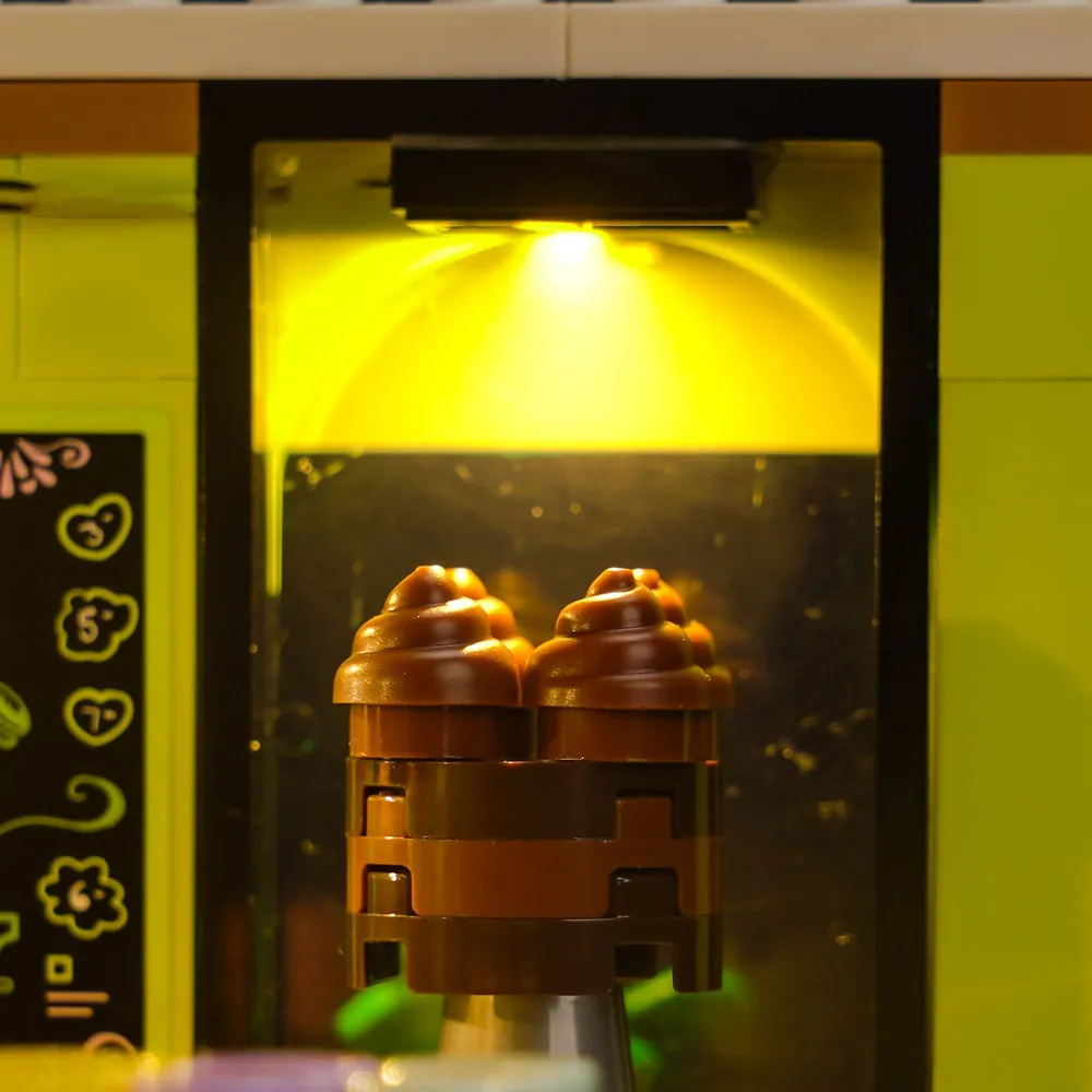 Close-up of BrickBling micro-LEDs concealed in the Heartlake City Café build