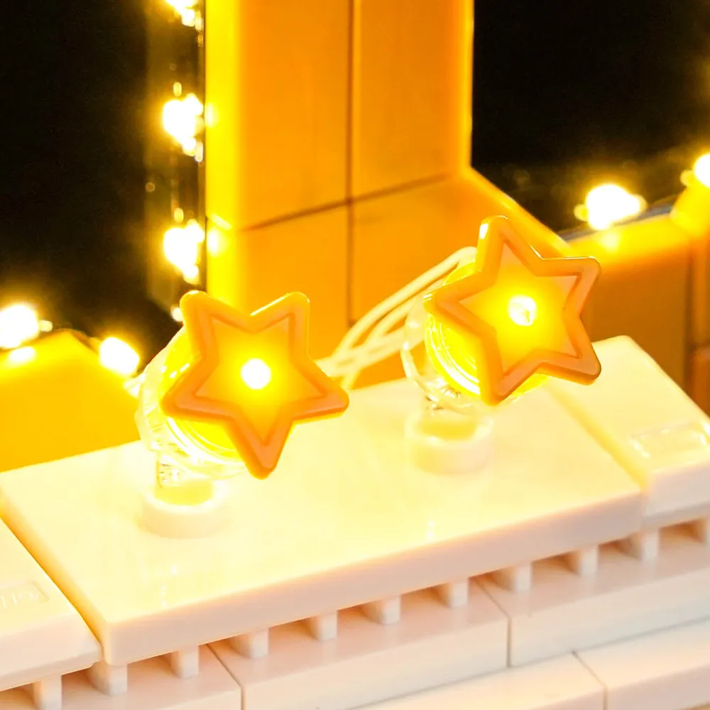 Close-up of BrickBling micro-LEDs on the Arc de Triomphe in the LEGO Mbappé set