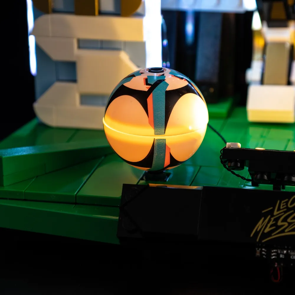 Game of Bricks light kit for LEGO 43015 illuminating the stadium backdrop