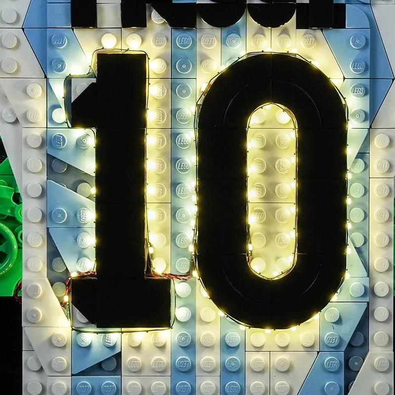 BrickBling modular light installation on LEGO Messi Celebration set showing detailed greebling illumination