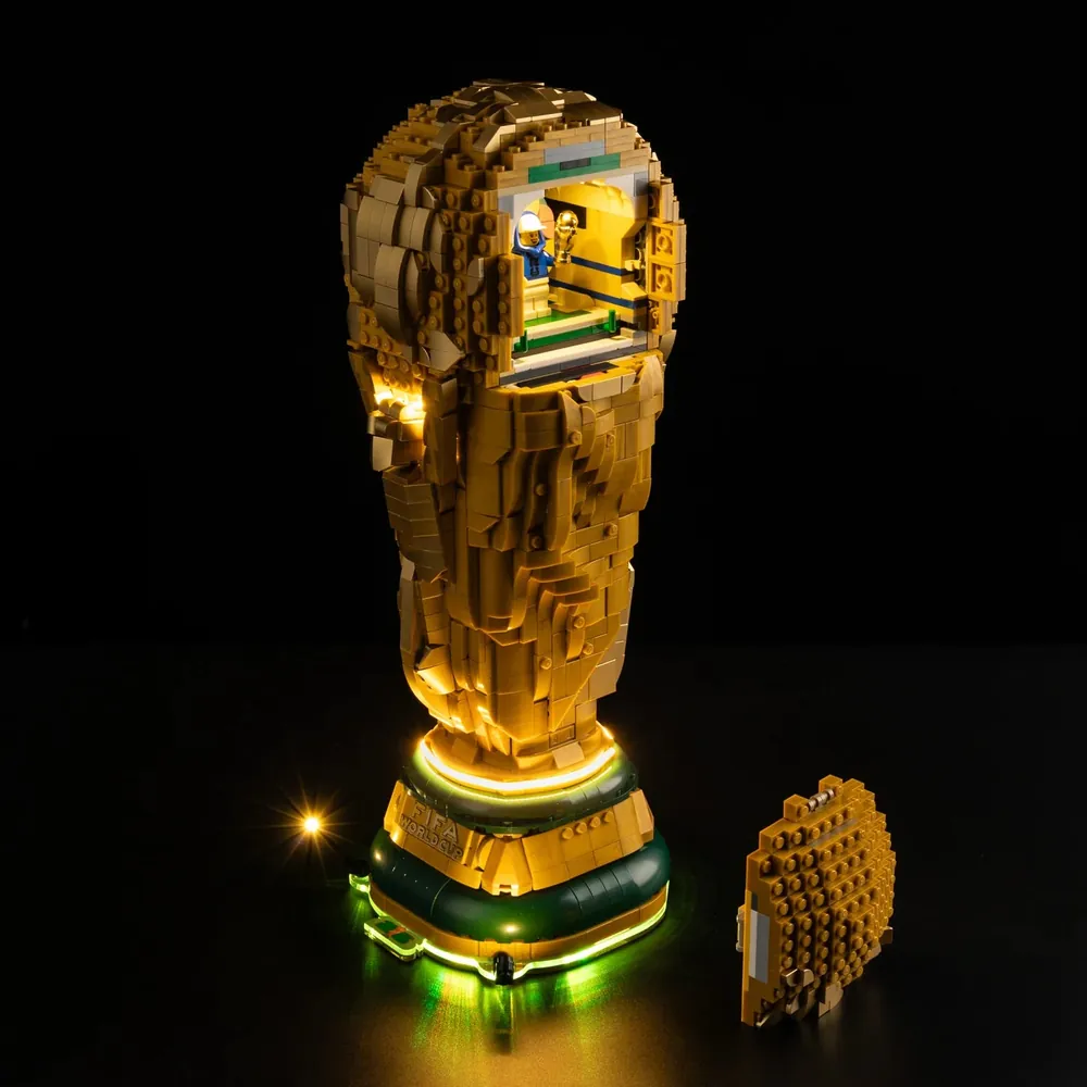 Game of Bricks LED glow on golden trophy surface