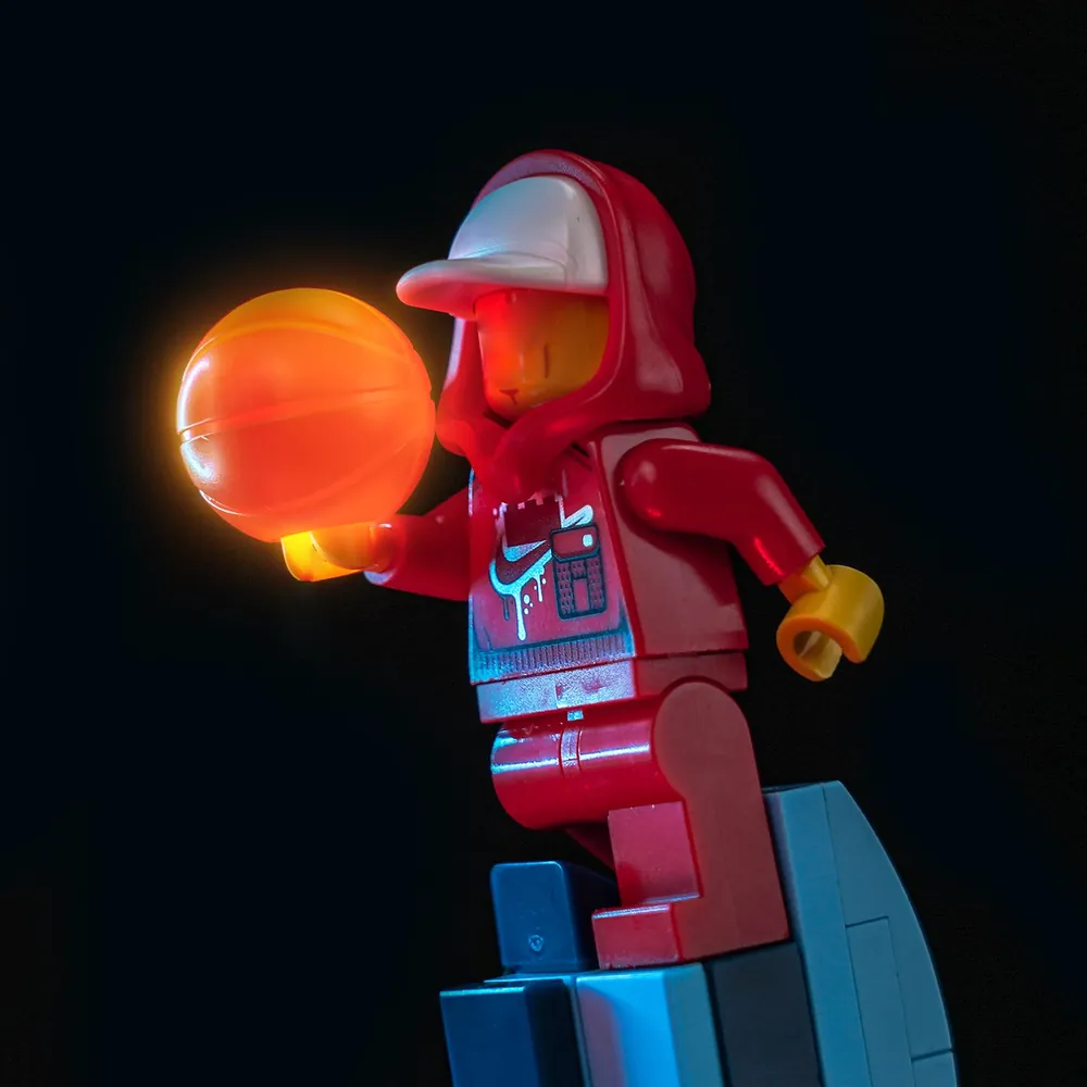 LEGO Nike Dunk Trickshot with BrickBling lights glowing in a dark room