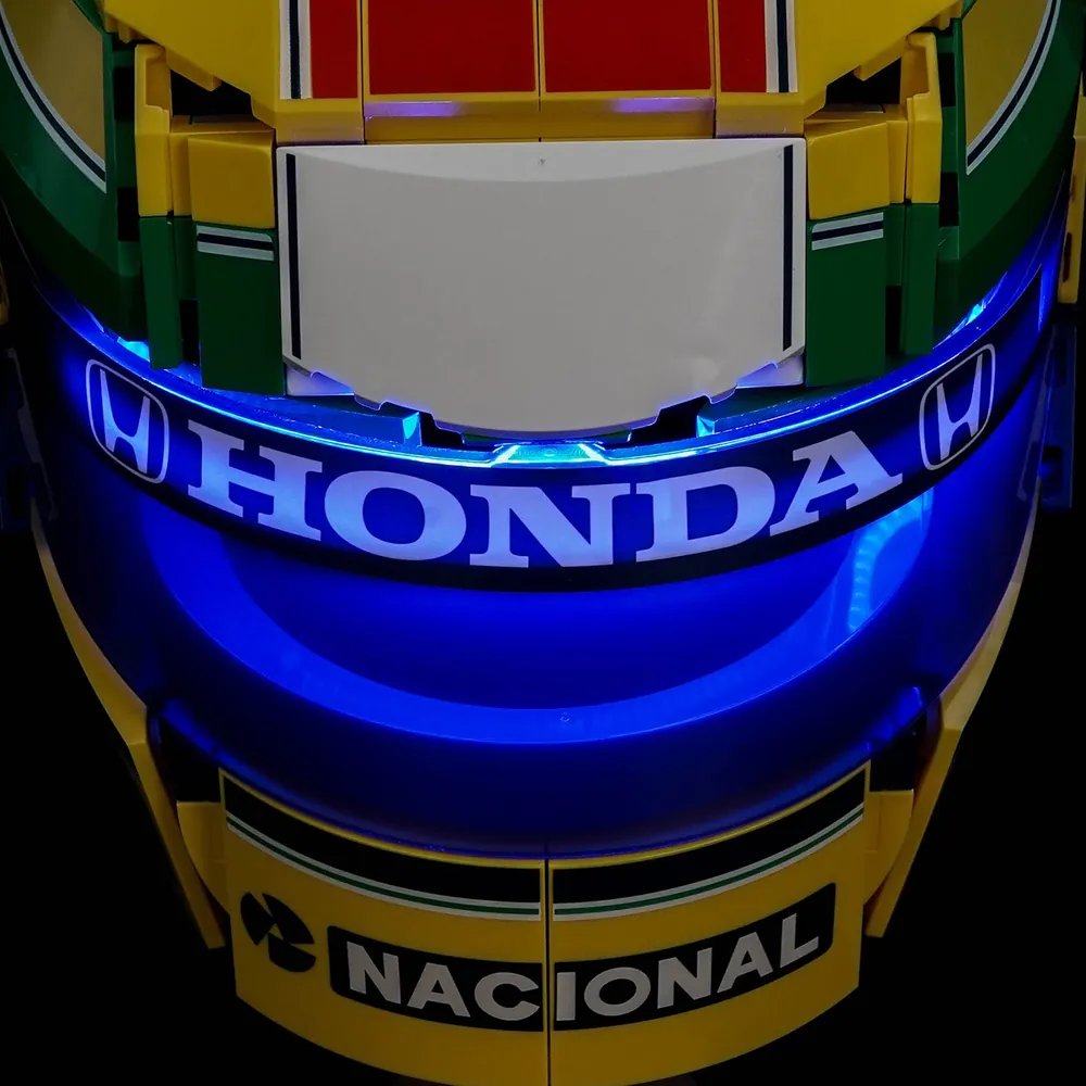 Close-up of BrickBling modular micro-LEDs on the LEGO Senna Helmet's visor and curves