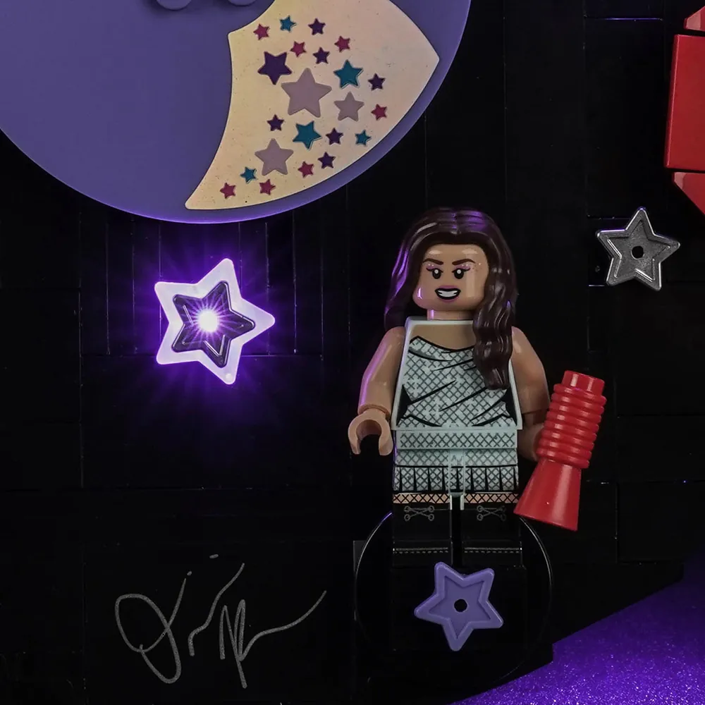 Close-up of BrickBling micro-LEDs on LEGO 43028 showcasing the spinning record