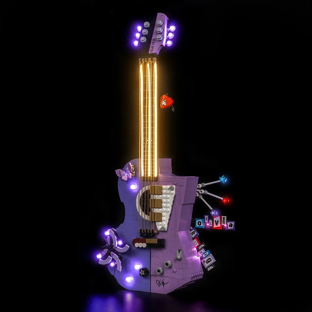 BrickBling LED kit for LEGO Olivia Rodrigo's Dual Guitar, showing modular micro-LEDs illuminating the dressing room and acoustic side