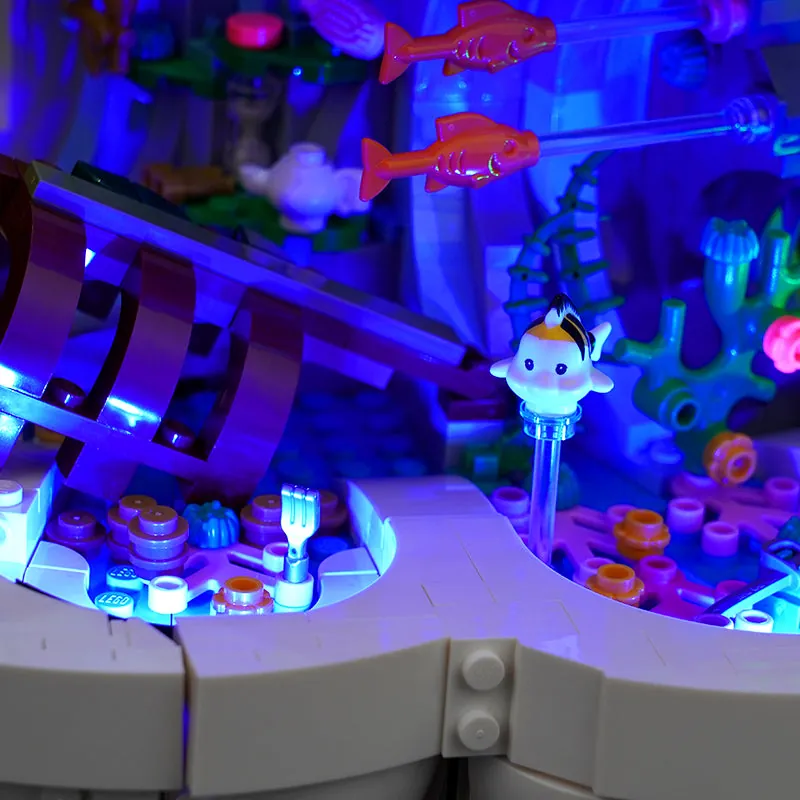 Close-up of BrickBling modular micro-LEDs inside the LEGO clamshell
