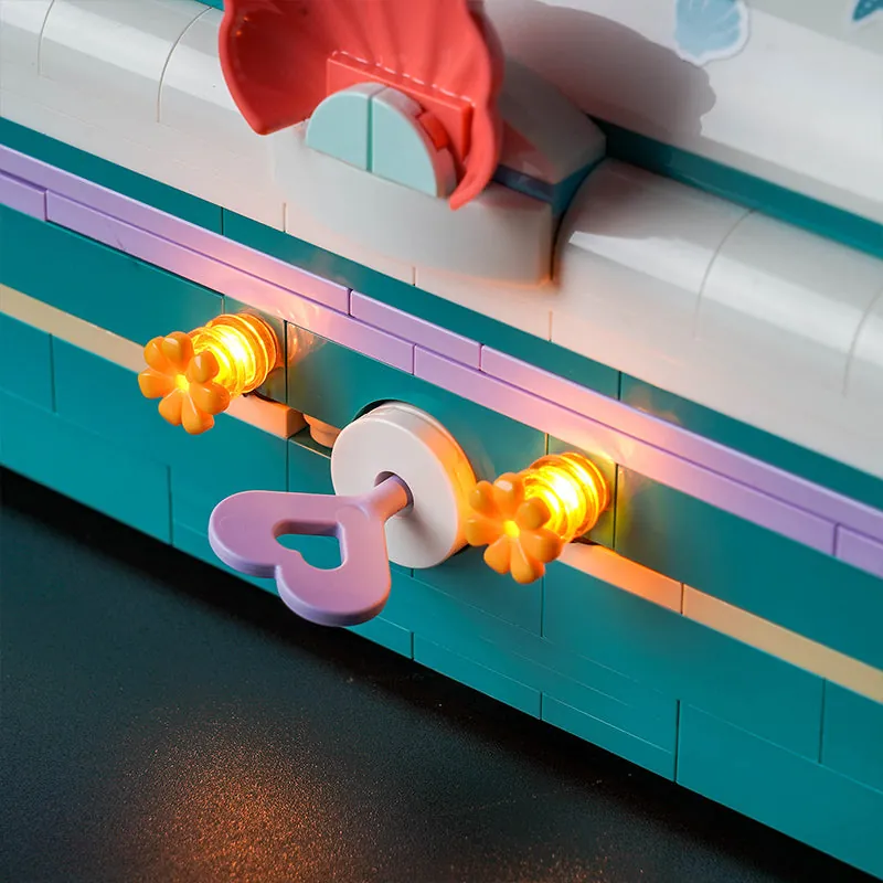 Close-up of BrickBling micro-LED wiring on LEGO 43229 Ariel's Treasure Chest