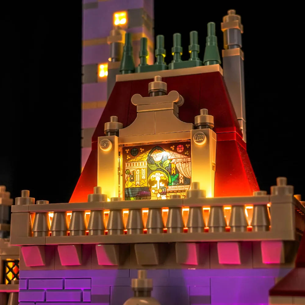 LEGO 43263 with BrickBling lights illuminating the ballroom