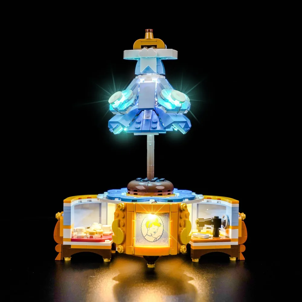 BrickBling LED lights illuminating LEGO Disney Cinderella's Dress 43266 with warm glow on dress and hidden scenes