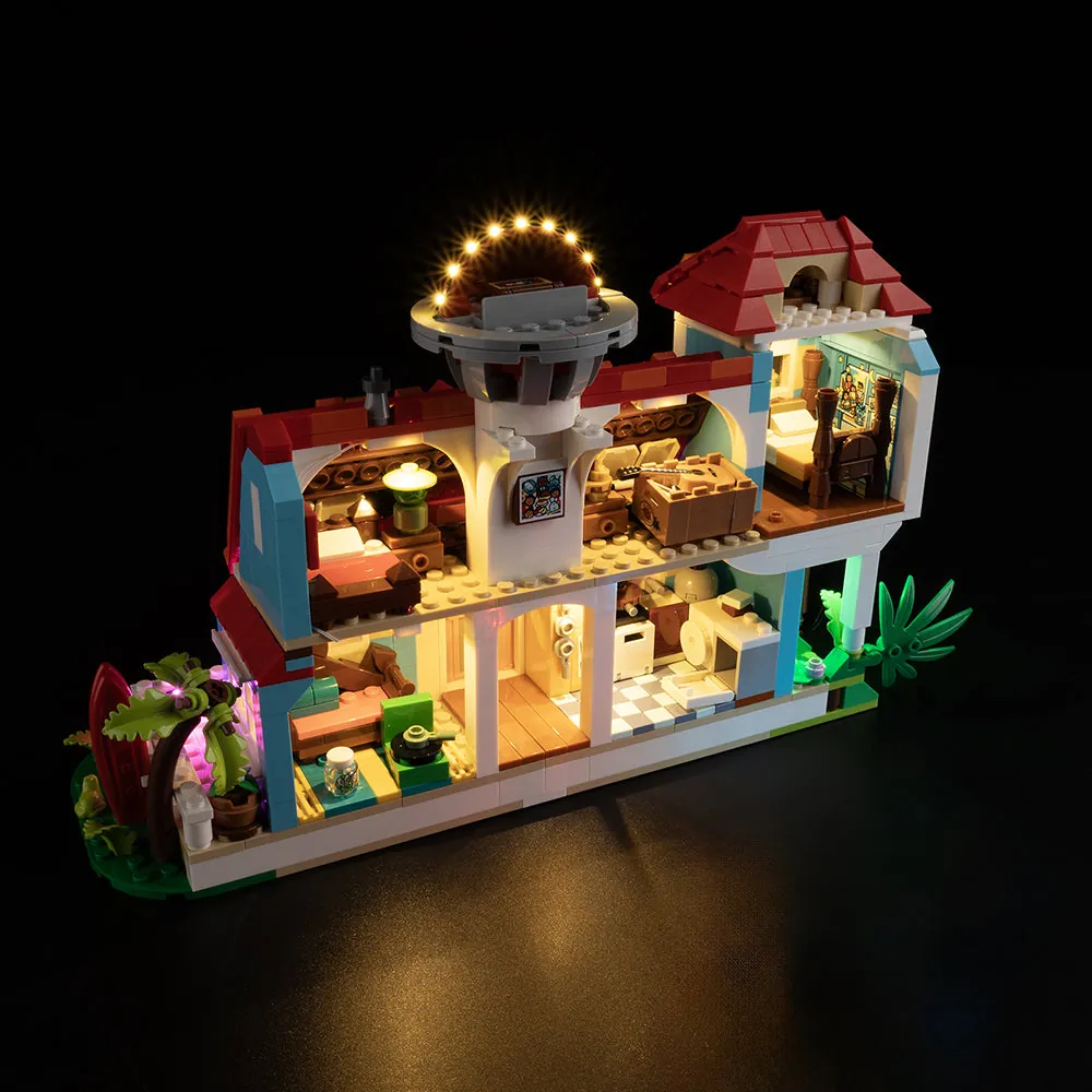 Well-lit LEGO beach house with Game of Bricks lights