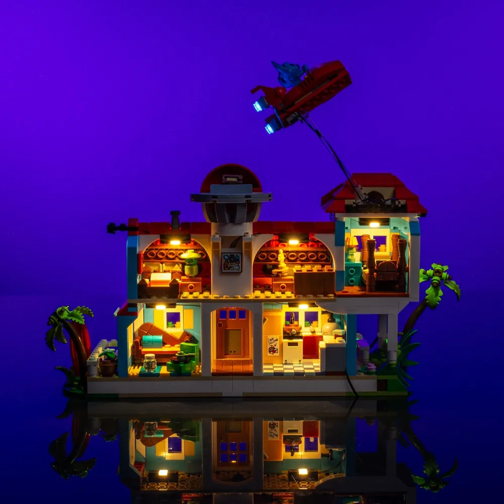 Vibrant LEGO beach house with LightMyBricks lights
