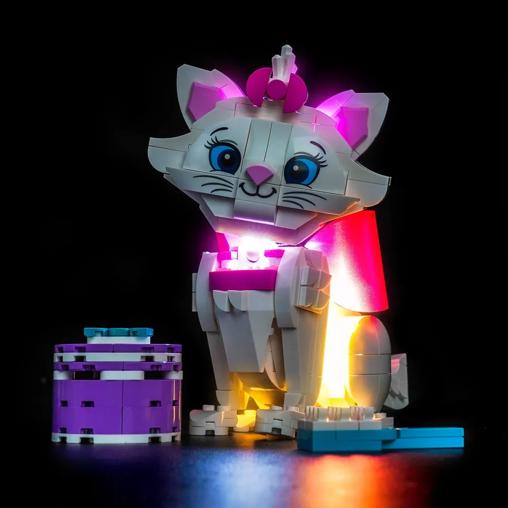 BrickBling LED kit lighting up LEGO Marie's face and musical notes