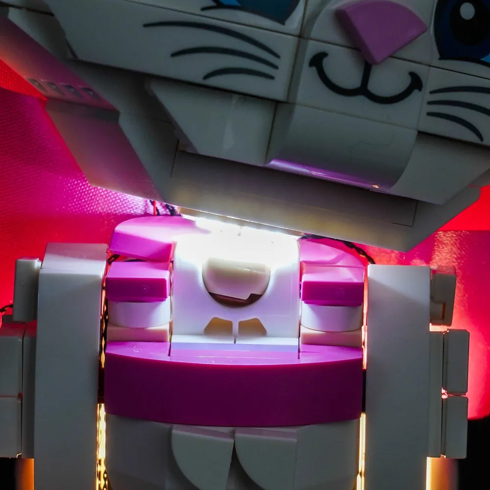 Close-up of BrickBling micro-LEDs on LEGO Marie's paw