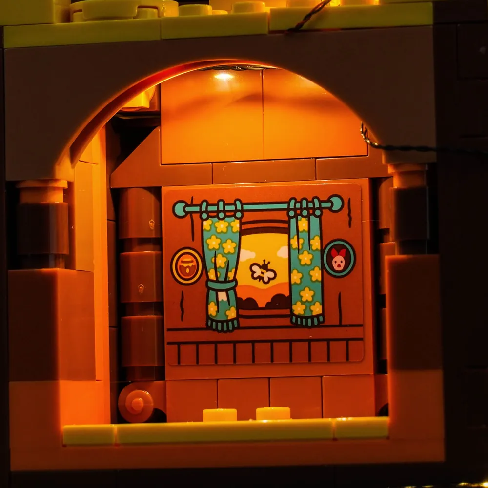 Close-up of BrickBling modular micro-LEDs concealed in LEGO Winnie the Pooh treehouse
