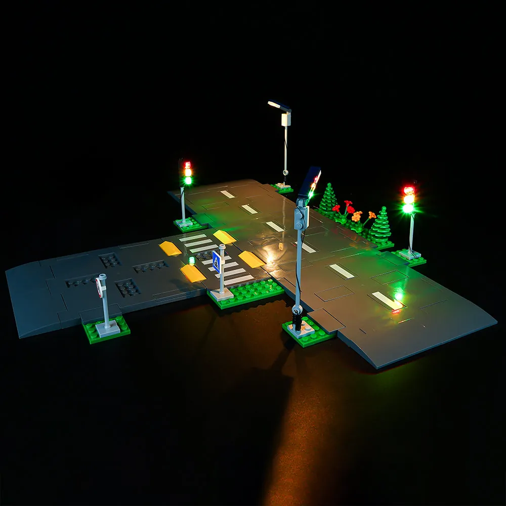 Game of Bricks lighting kit for LEGO City Road Plates 60304 installed on a city layout
