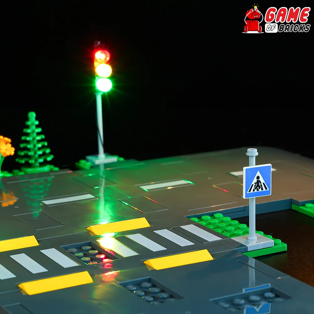 LEGO City Road Plates 60304 with streetlights illuminated by Game of Bricks kit