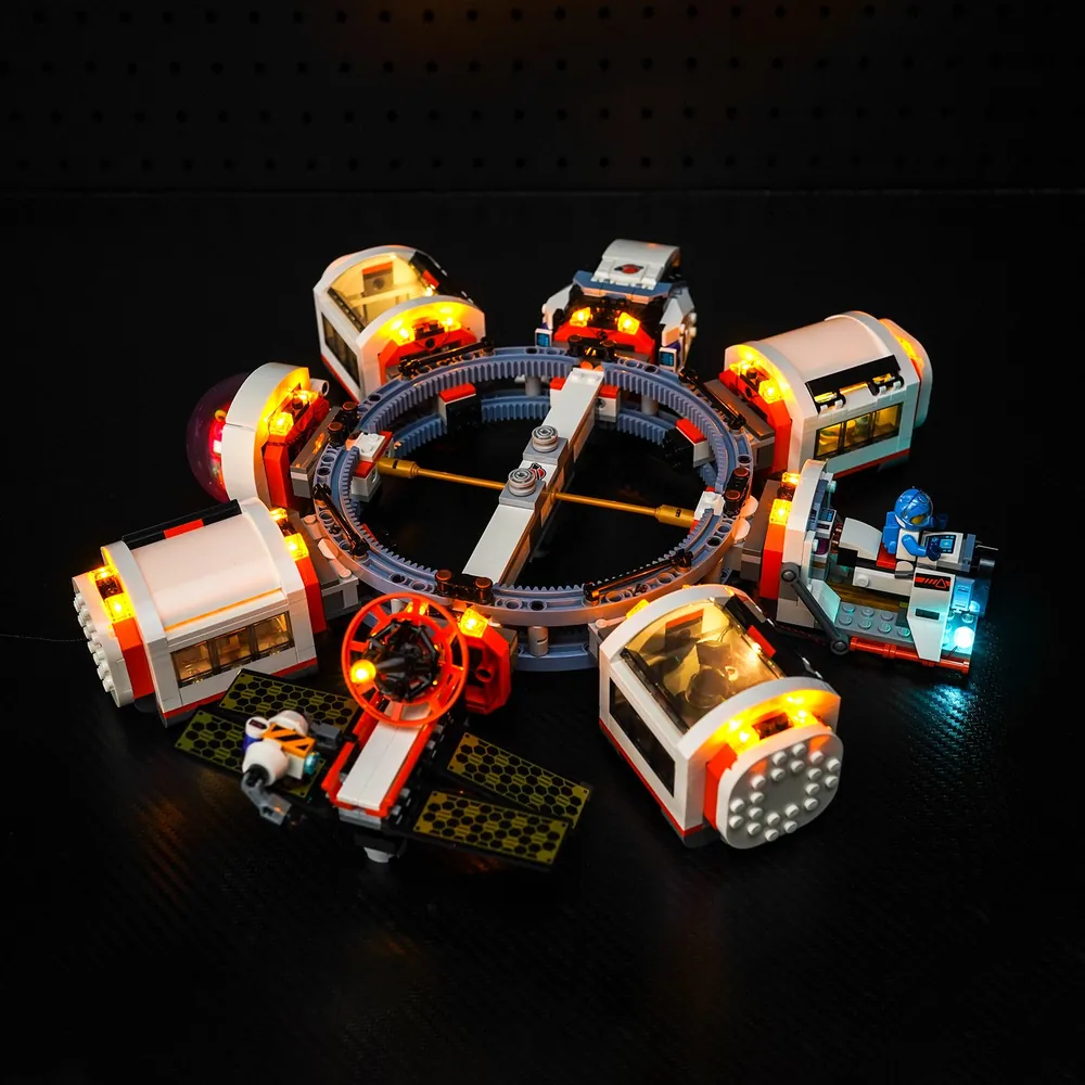 BrickBling LED kit illuminating the central ring and habitat modules of the LEGO City Modular Space Station 60433