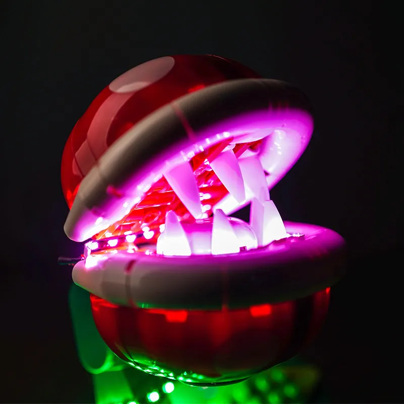 Close-up of BrickBling micro-LEDs concealed within the Piranha Plant LEGO build