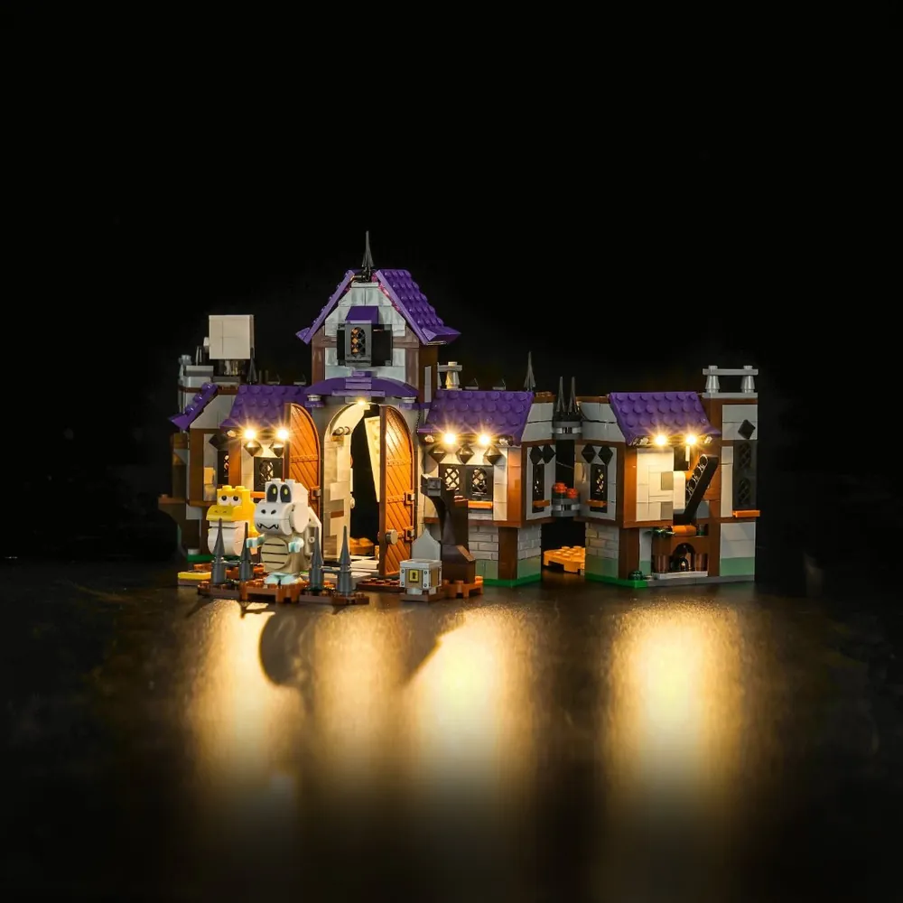 Close-up of BrickBling modular micro-LEDs on LEGO King Boo's Haunted Mansion, showing the pre-soldered harness