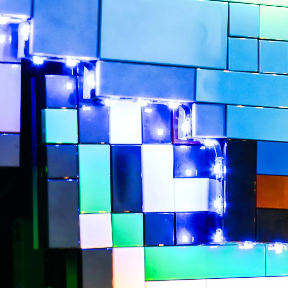 Close-up of BrickBling modular micro-LEDs on Mario and Yoshi set