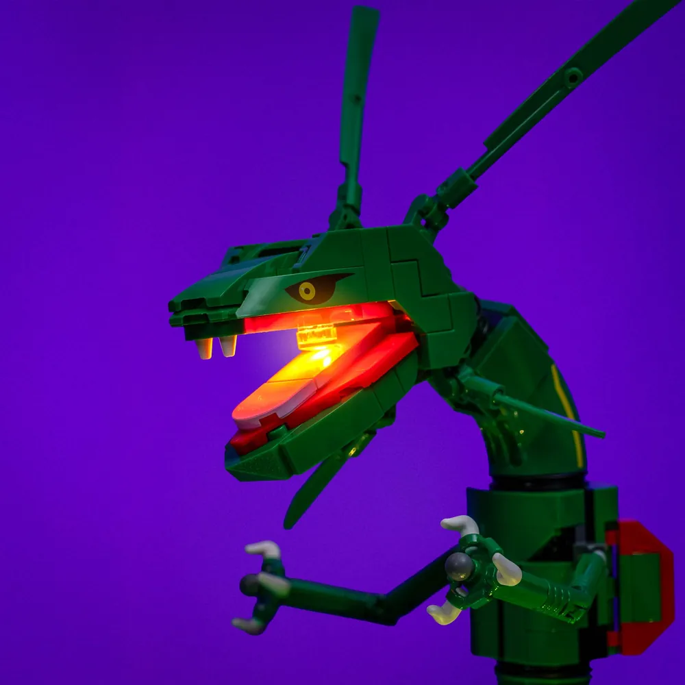 Close-up of the LightMyBricks wiring harness on the LEGO Rayquaza set, showcasing the pre-soldered connections