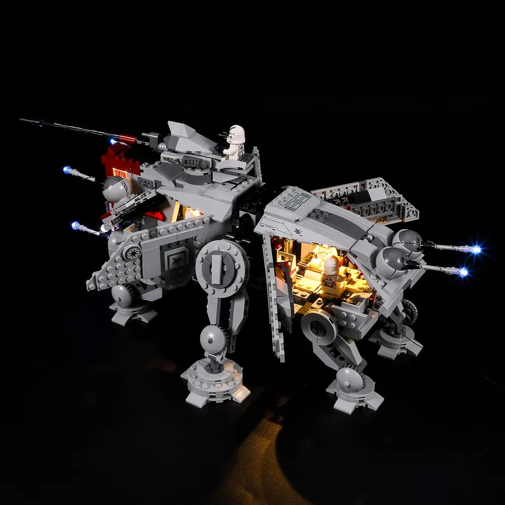 AT-TE Walker lit in a dark room with lights on main cannon and side hatches