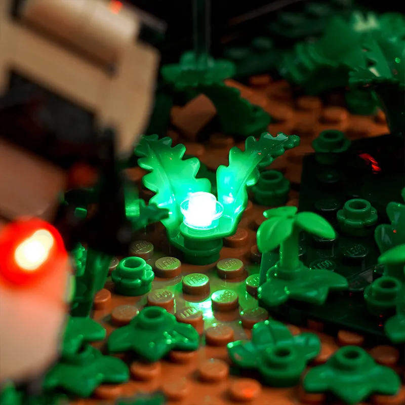 Close-up of BrickBling micro-LEDs on LEGO speeder chase diorama