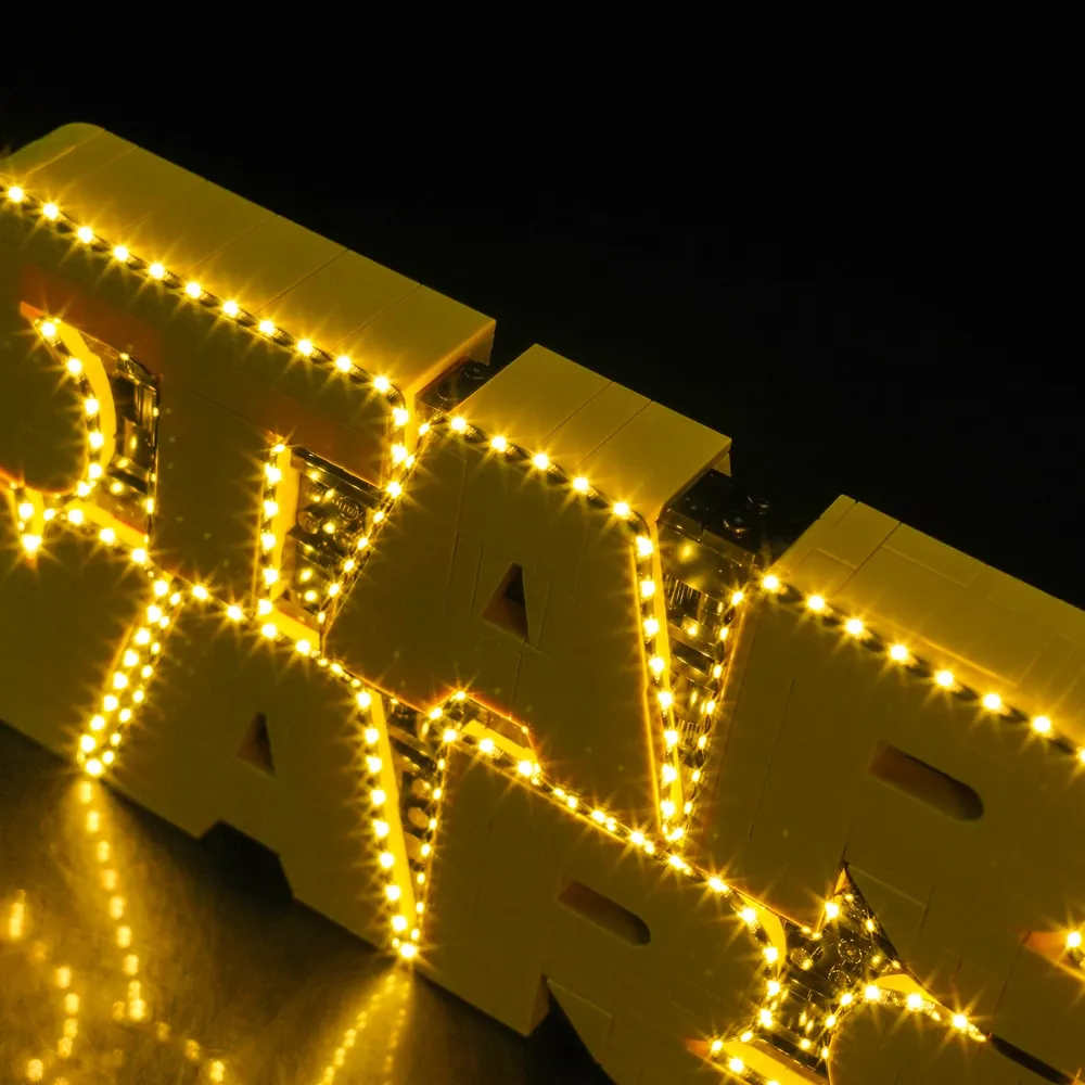 Close-up of BrickBling micro-LEDs on LEGO Star Wars Logo 75407