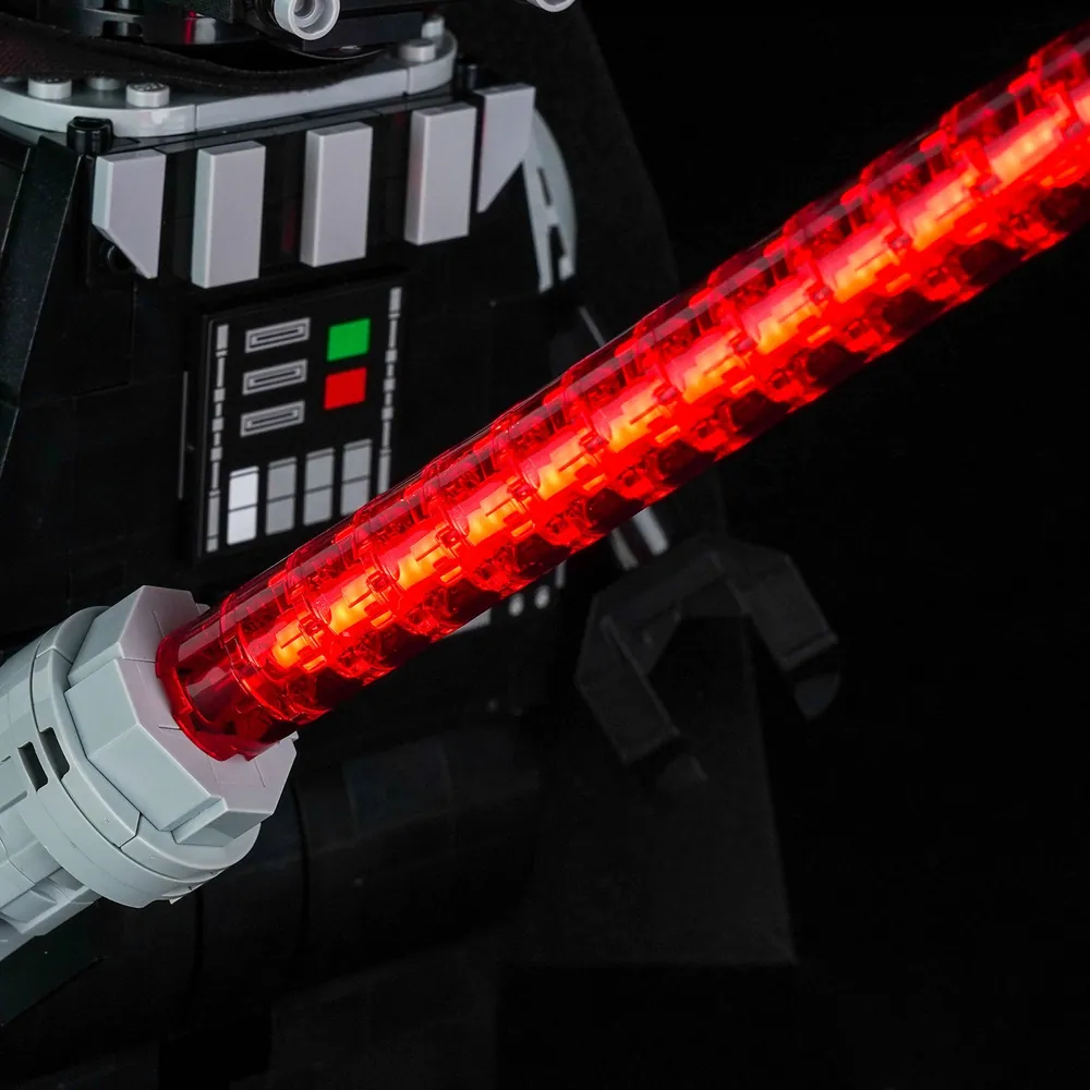 Close-up of BrickBling modular micro-LED wiring on LEGO Darth Vader minifigure