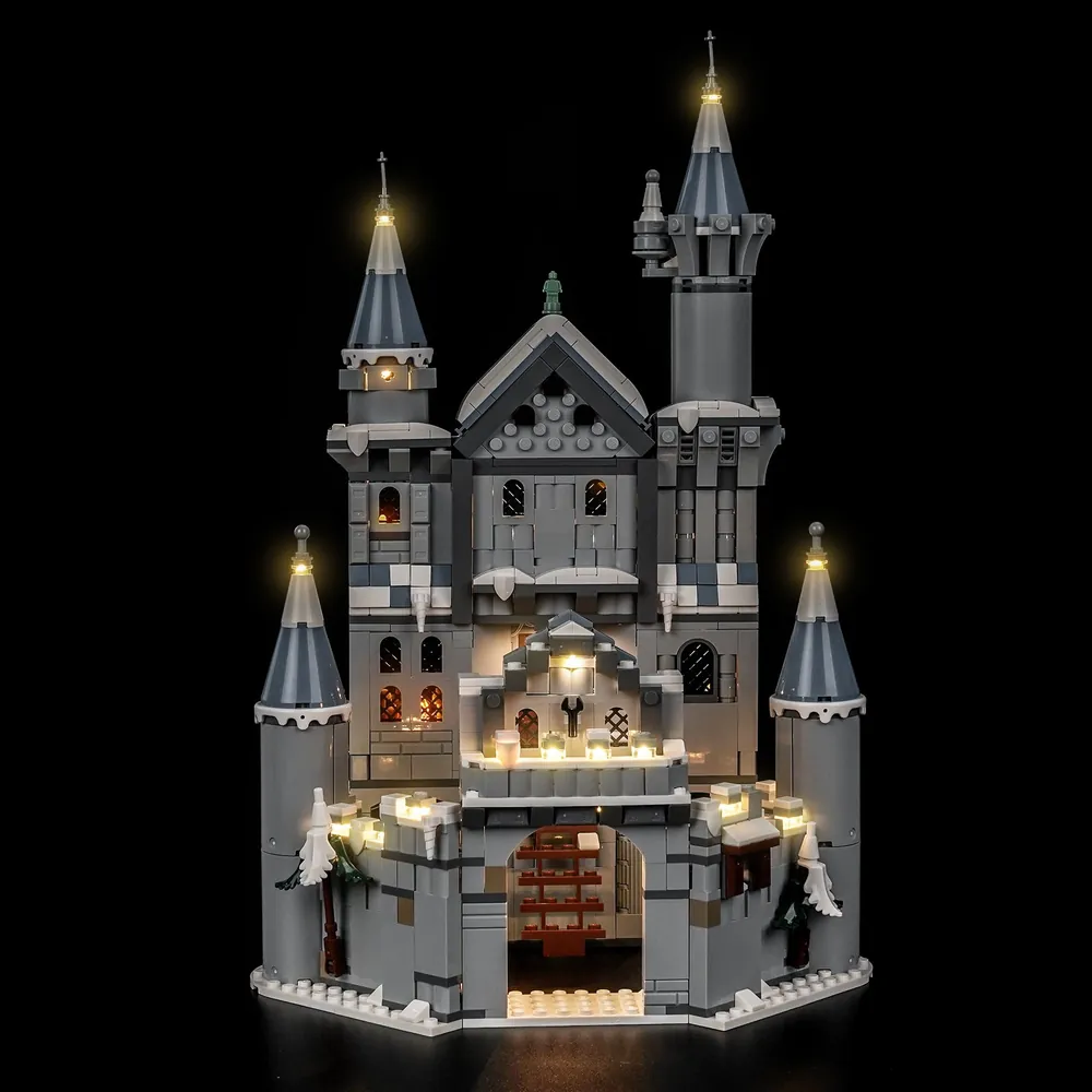 BrickBling Light Kit for LEGO 75645 Drum Castle with warm white LEDs on snow-covered walls