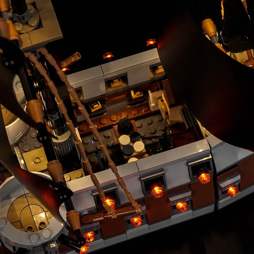 Close-up of BrickBling lighting zones on LEGO One Piece Marine Battleship, highlighting interior rooms